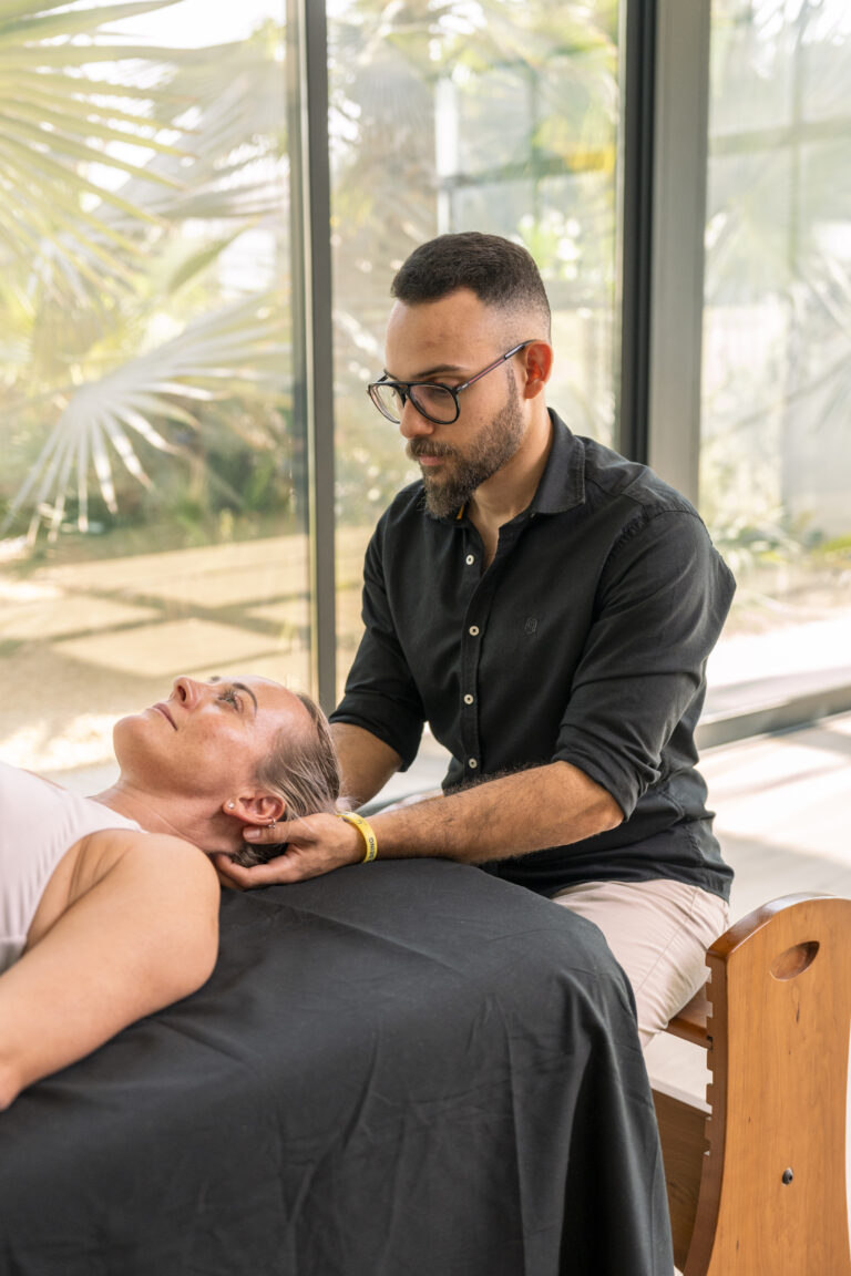 Ayman Ragab performing hands-on Rolfing Structural Integration work with a client